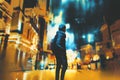 Young woman standing in night city Royalty Free Stock Photo