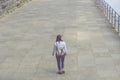 Young Woman Standing, Walking On Promenade By River In City During Summer Royalty Free Stock Photo