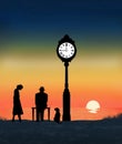 A young woman stands nearby as her elderly father and his dog pass the time watching a sunset