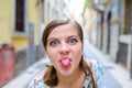 Young woman sticking her tongue out Royalty Free Stock Photo