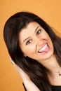 Young woman sticking out her tongue Royalty Free Stock Photo