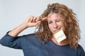 Young woman with a sticky note in her face Royalty Free Stock Photo