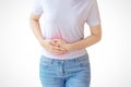 Woman stomachache on white wall background. Royalty Free Stock Photo