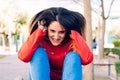 Young woman stressed and anxious with her hands in her hair and crazy face Royalty Free Stock Photo