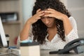 young woman stressed at work