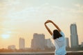 Young woman stretching before doing her workout in the morning Royalty Free Stock Photo