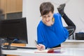 young woman stretching in the office Royalty Free Stock Photo