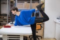woman stretching in the office Royalty Free Stock Photo