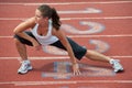 Young Woman Stretching on Running Track Royalty Free Stock Photo