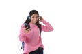 Young woman or student girl with mobile phone listening to music headphones singing and dancing Royalty Free Stock Photo