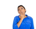 Young woman, student placing hand on mouth yawning Royalty Free Stock Photo