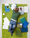 Young woman studying on floor Royalty Free Stock Photo