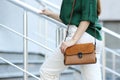 Young woman with stylish leather bag on summer day, closeup Royalty Free Stock Photo