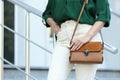 Young woman with stylish leather bag on summer day, closeup Royalty Free Stock Photo