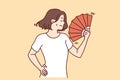 Woman suffer from heatstroke use hand fan