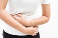 Young woman suffering from abdominal pain feeling stomachache, symptom of pms on white background