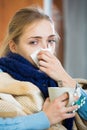 Young woman suffering of cold and having stuffy nose Royalty Free Stock Photo