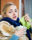 Young woman suffering of cold and having stuffy nose Royalty Free Stock Photo