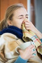 Young woman suffering of cold and having stuffy nose Royalty Free Stock Photo