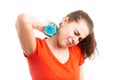 Young woman suffering from hot weather cooling with water bottle