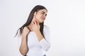 Young woman suffering from itching on her skin and scratching an itchy place. Allergic reaction to insect bites, dermatitis, food Royalty Free Stock Photo