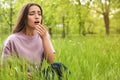 Young woman suffering from seasonal allergy outdoors Royalty Free Stock Photo