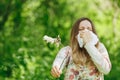 Young woman suffering spring pollen allergy