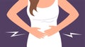 A young woman suffers from abdominal pain