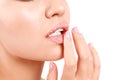 Young woman with sugar lips on white background