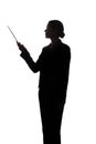 Young woman in suit shows pointer forward, side view - silhouette Royalty Free Stock Photo