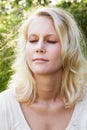 Young woman in summer daydreaming