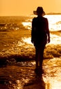 Young woman in summer dress standing in a sea Royalty Free Stock Photo