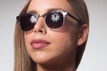 Young woman sunglasses close up head face hair beauty Royalty Free Stock Photo