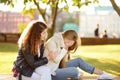 Young woman support and soothe her upsed friend. Two girl during the conversation Royalty Free Stock Photo