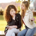 Young woman support and soothe her upsed friend Royalty Free Stock Photo