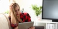 young woman surfing the internet hold tablet in arms search information Royalty Free Stock Photo