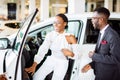 Young woman surprised by new car, gift for my beautiful wife Royalty Free Stock Photo