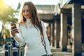 Young woman sweater in hand smartphone mobile phone talking on the phone Royalty Free Stock Photo