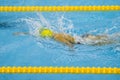 Young woman swimmer in blue pool Royalty Free Stock Photo