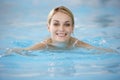 Young Woman Swimming In Pool Royalty Free Stock Photo