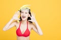 Young woman in swimsuit and shouting