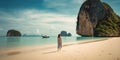 Young woman in swimsuit walking on the beach in Thailand.