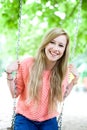 Young woman on swing