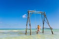 Young woman on swing Phu Quoc