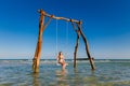 Young woman on swing Phu Quoc Royalty Free Stock Photo