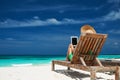 Young woman with tablet pc at the beach Royalty Free Stock Photo