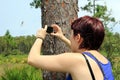 A young woman takes a photo Royalty Free Stock Photo