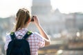 Young woman takes a picture of Saint Peter Cathedral Royalty Free Stock Photo