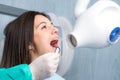 Young woman taking dental x-ray. Royalty Free Stock Photo