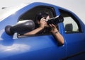 Young woman taking photos with telephoto lens